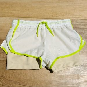 Girls Nike Dry Fit shorts, size small, lined. Very gently used.